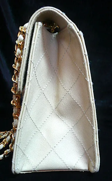 Authentic Chanel Vintage Beige Quilted Caviar 2.55 Flapover