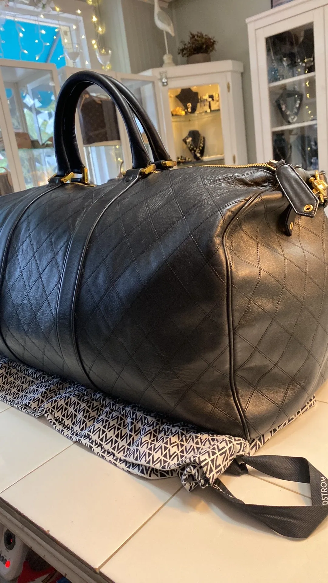 CHANEL Diamond Quilted Lambskin Leather Boston XL Travel Bag In Black