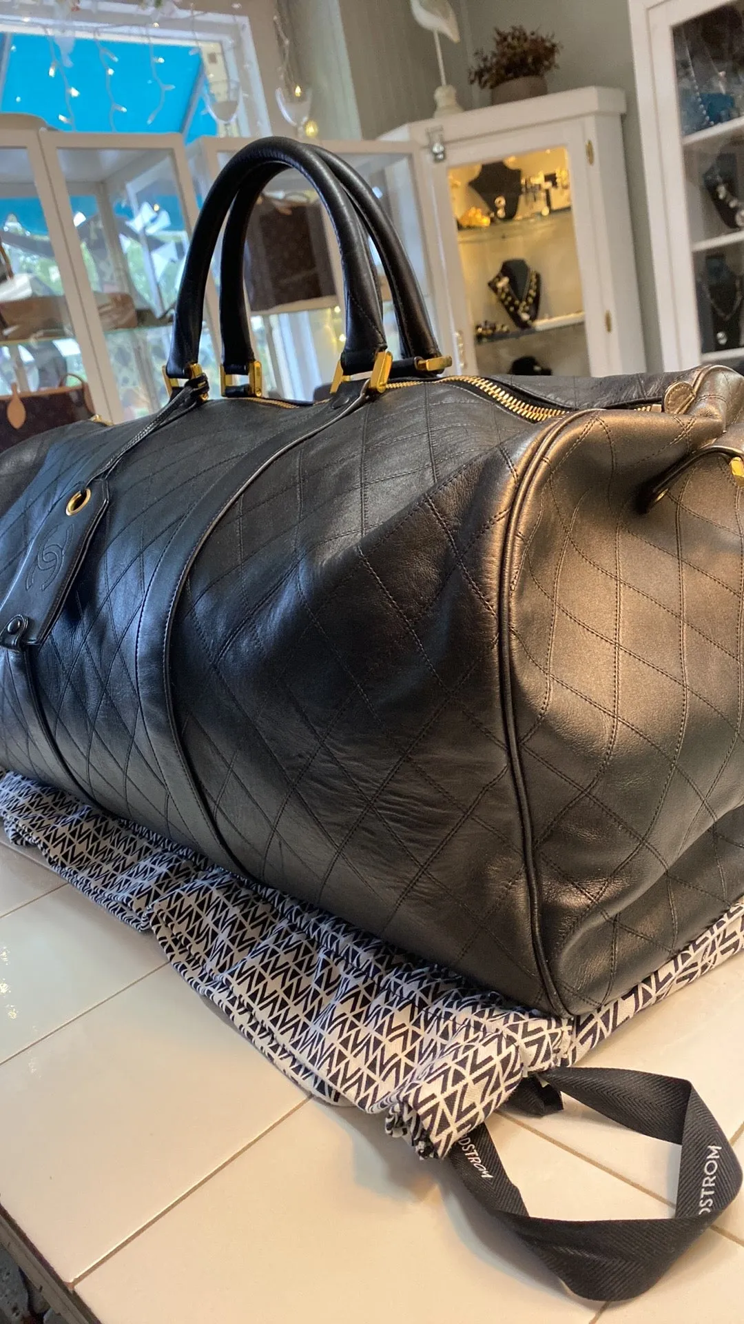 CHANEL Diamond Quilted Lambskin Leather Boston XL Travel Bag In Black