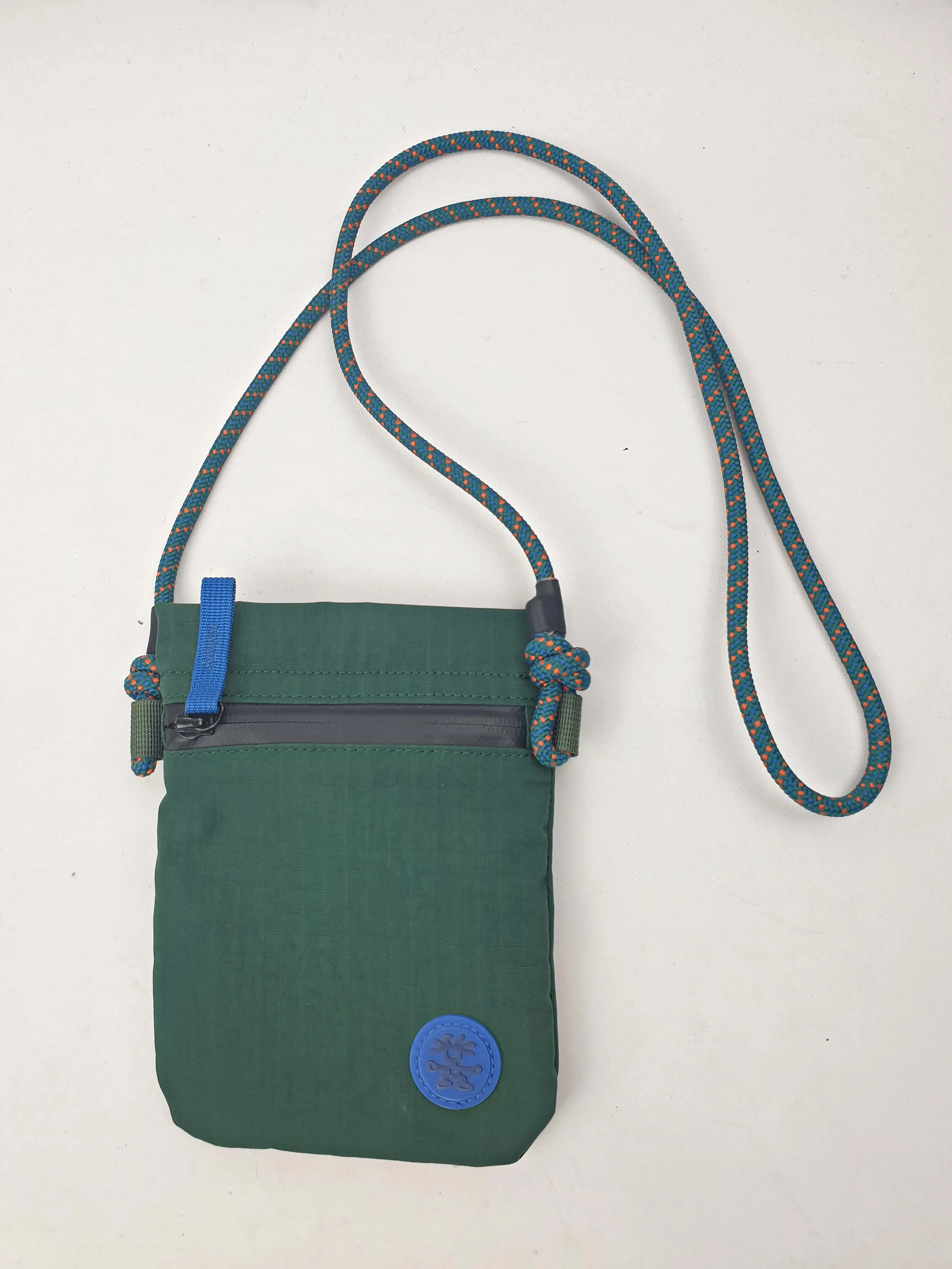 Crumpler green "the complete flop" mini cross body bag