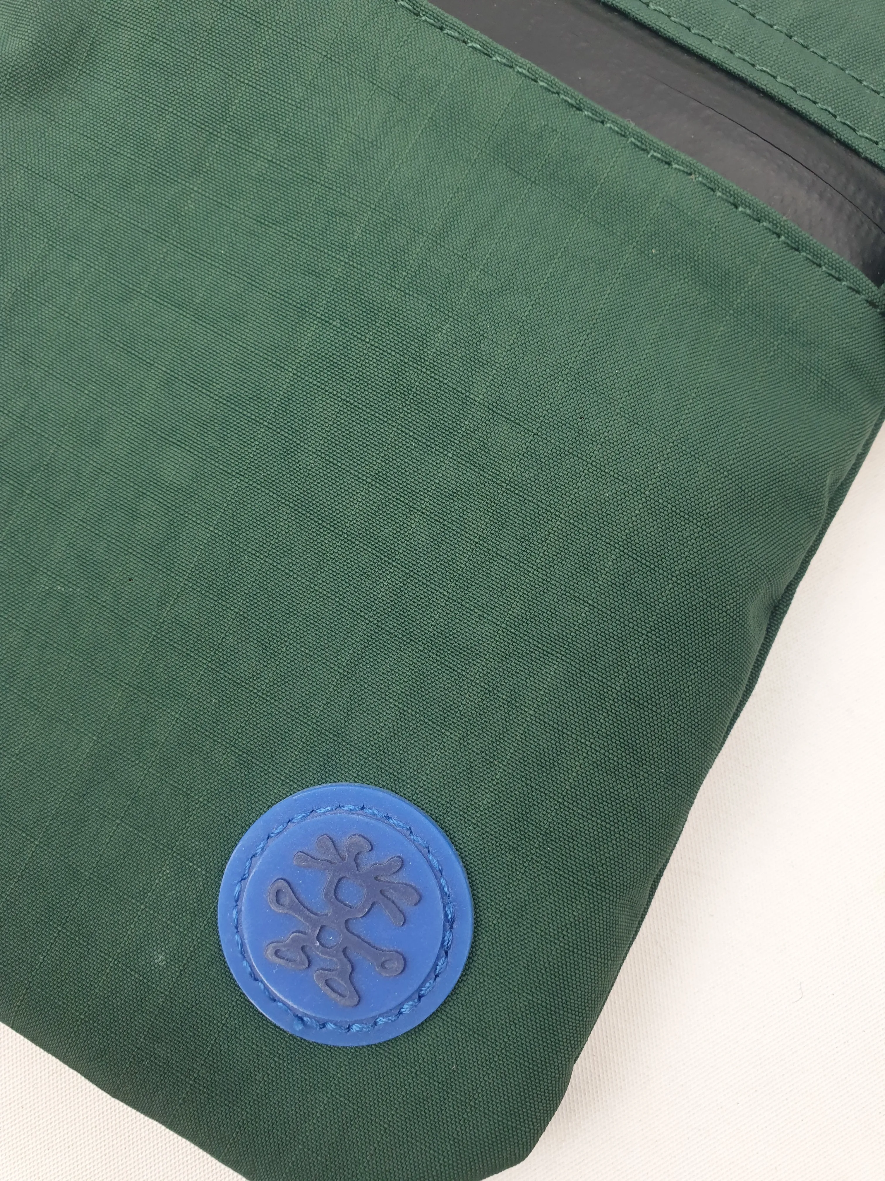 Crumpler green "the complete flop" mini cross body bag
