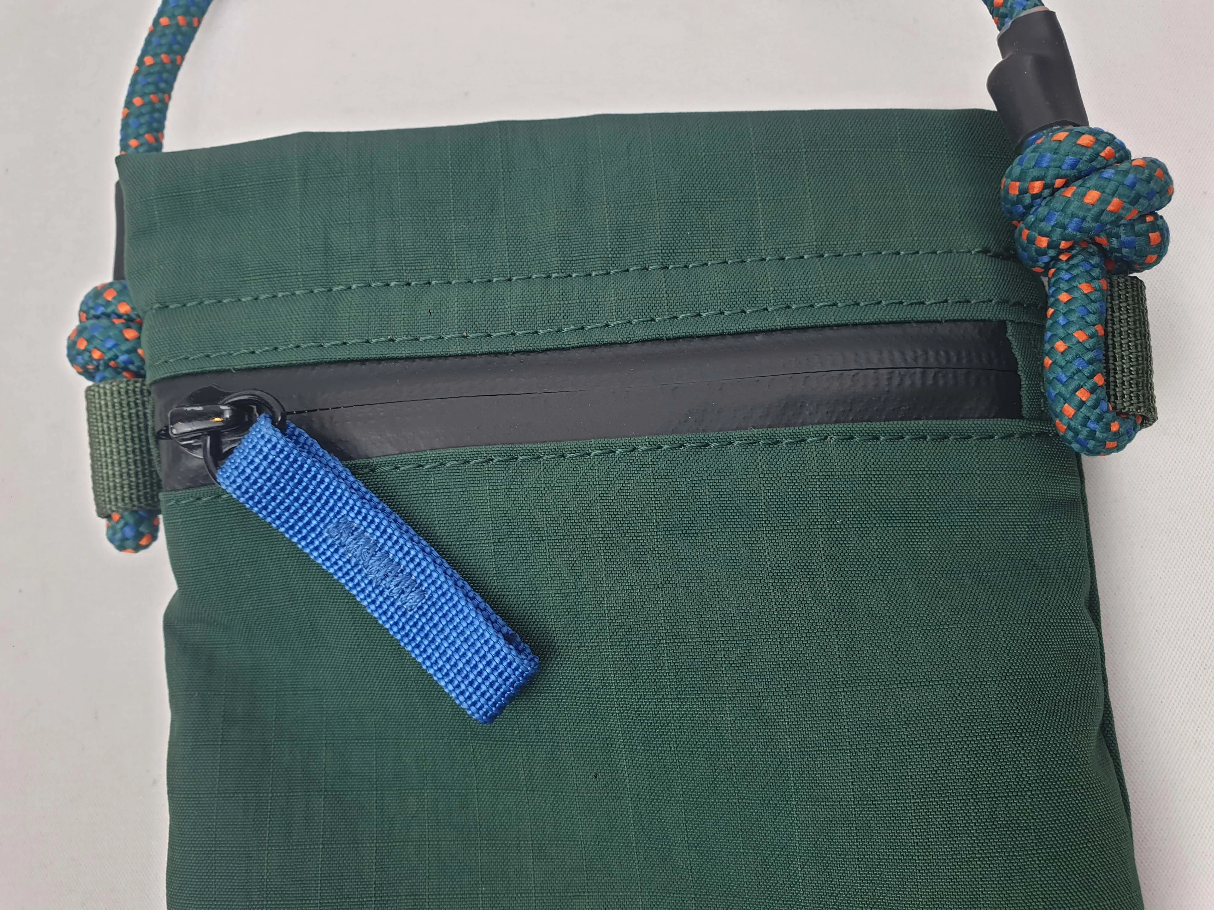 Crumpler green "the complete flop" mini cross body bag
