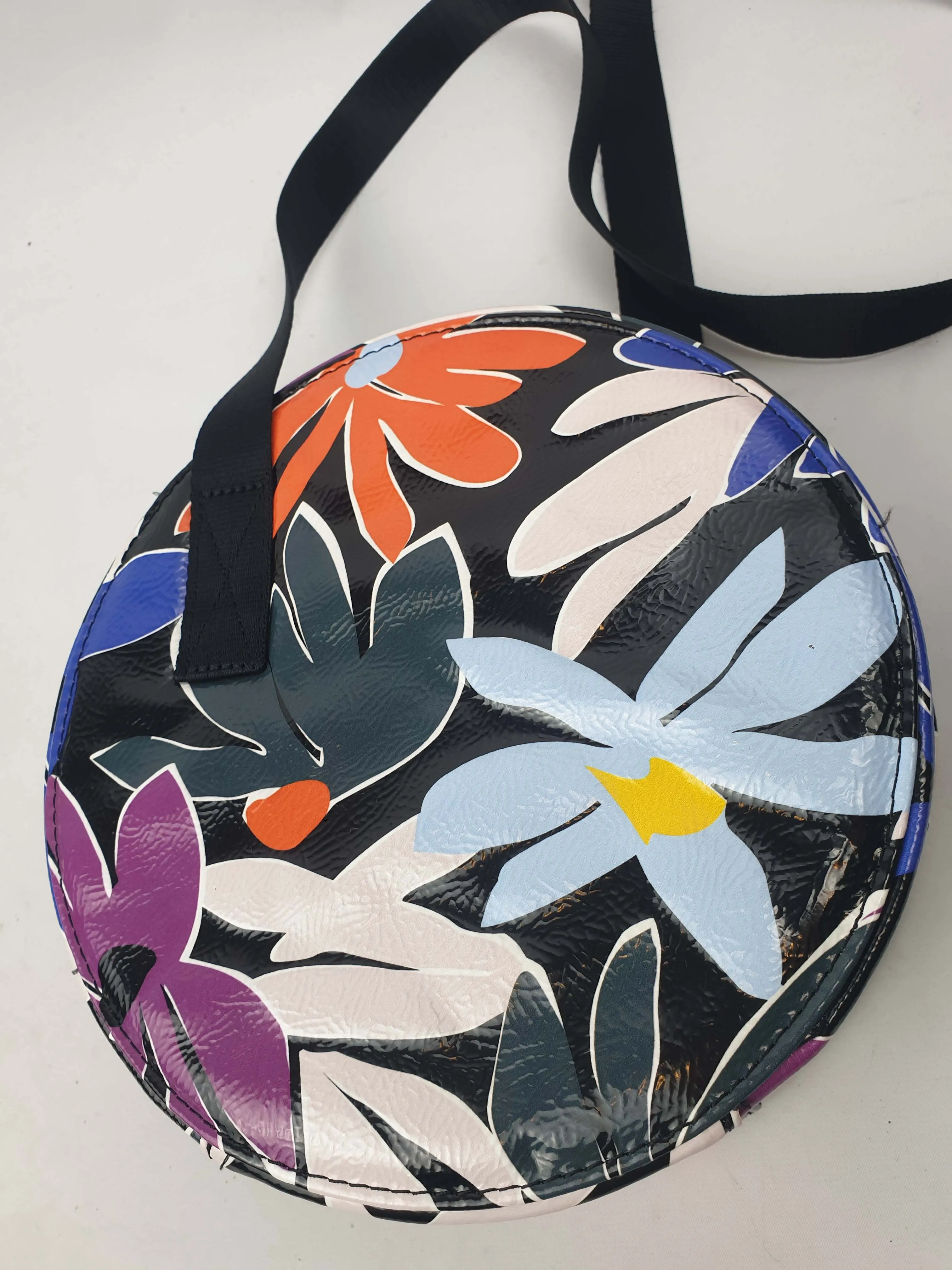 Gorman vibrant faux leather flower print round shaped bag