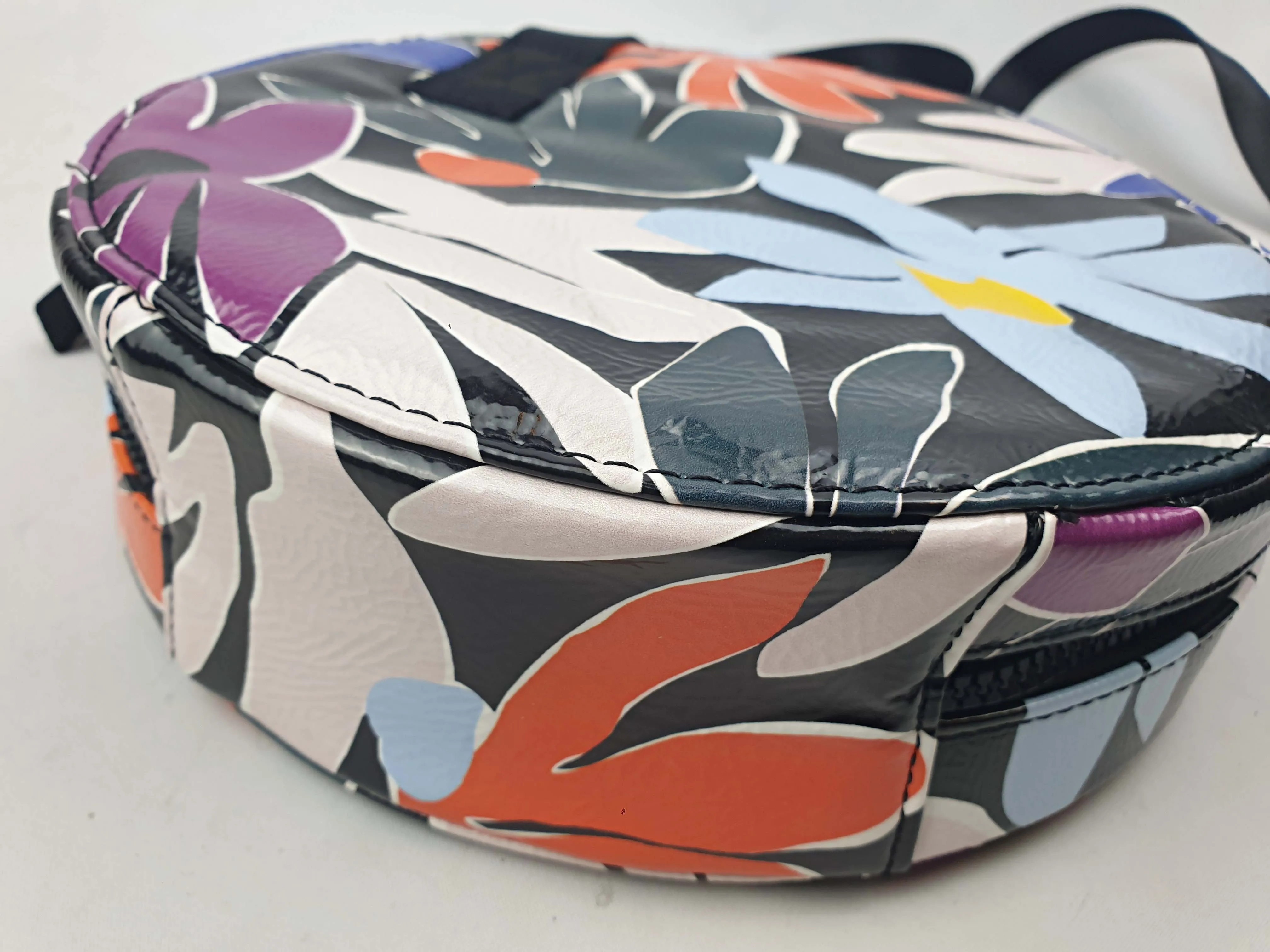 Gorman vibrant faux leather flower print round shaped bag