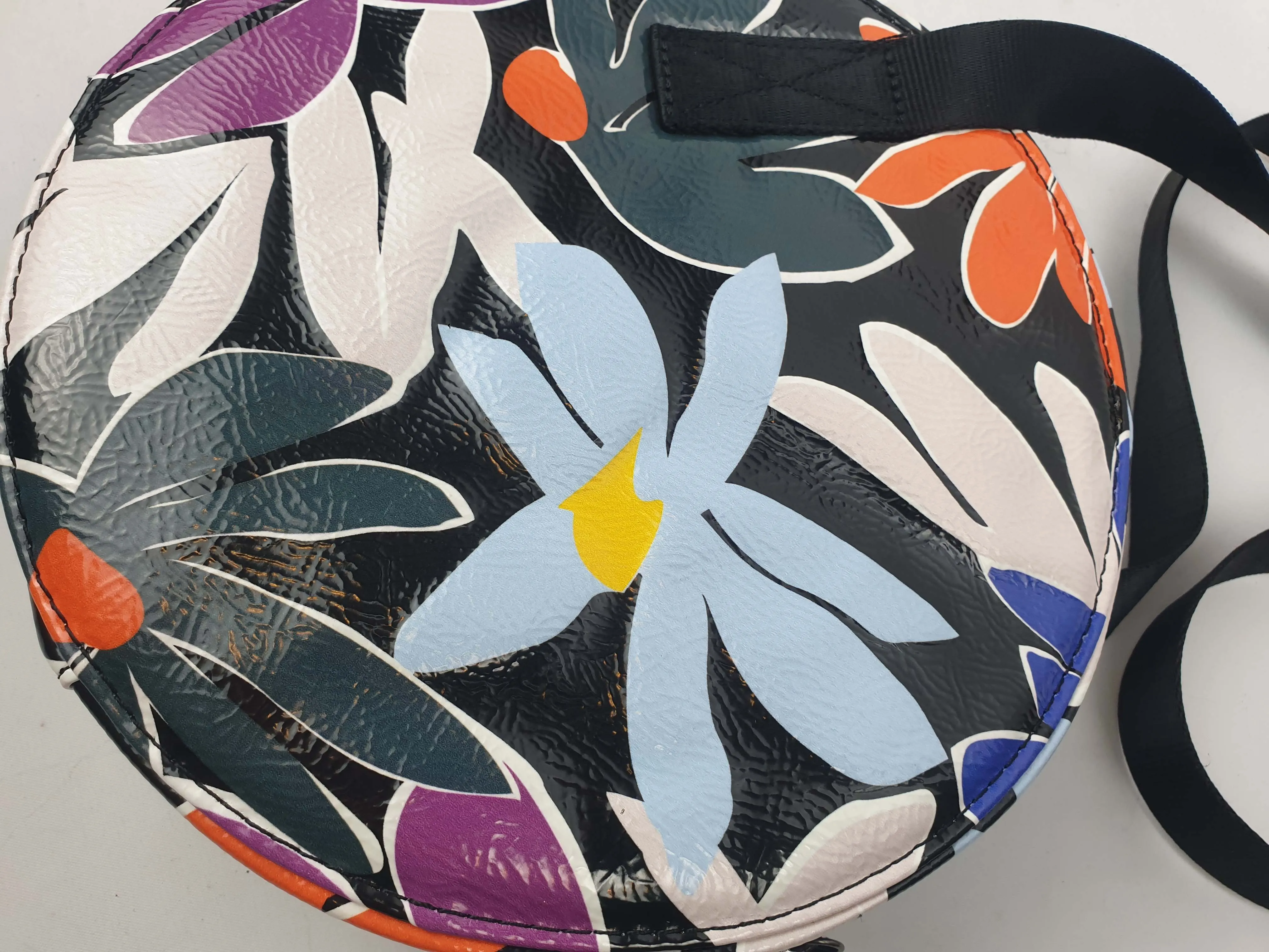 Gorman vibrant faux leather flower print round shaped bag