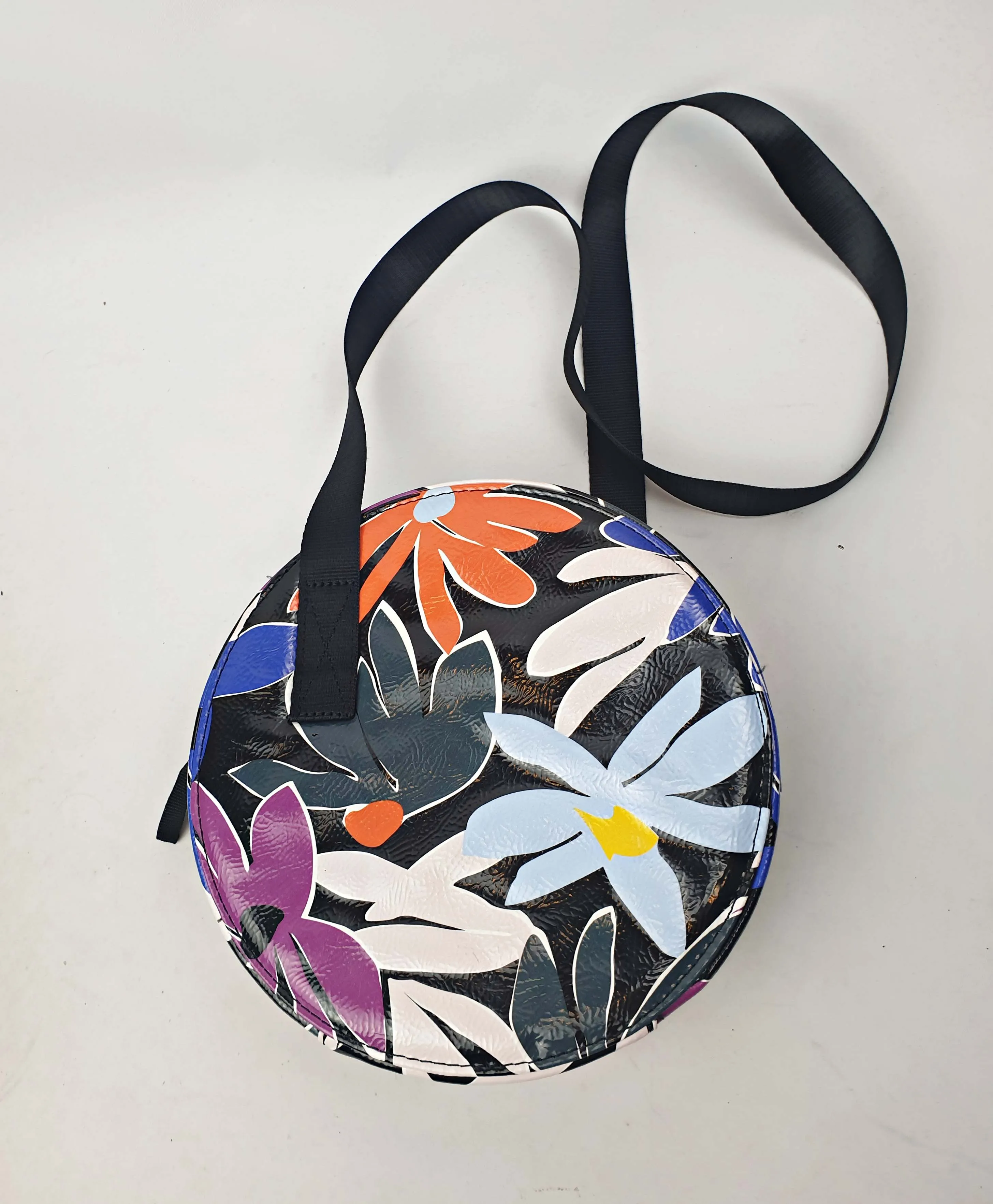 Gorman vibrant faux leather flower print round shaped bag