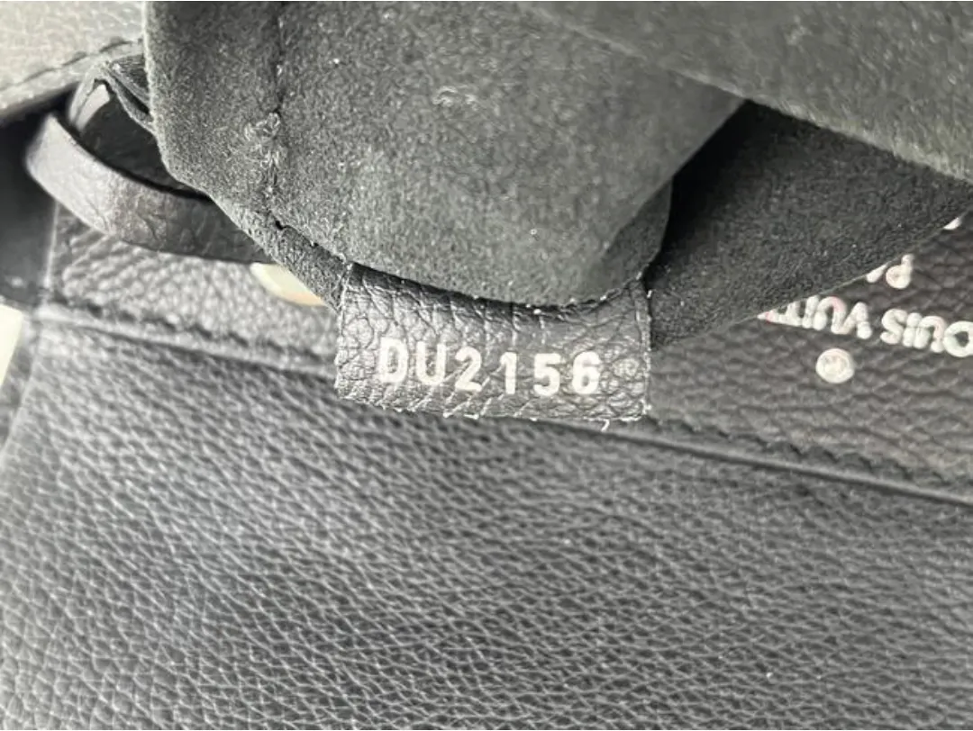 Louis Vuitton Calfskin Leather Lockme MM Backpack in Black