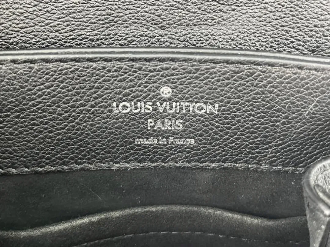 Louis Vuitton Calfskin Leather Lockme MM Backpack in Black