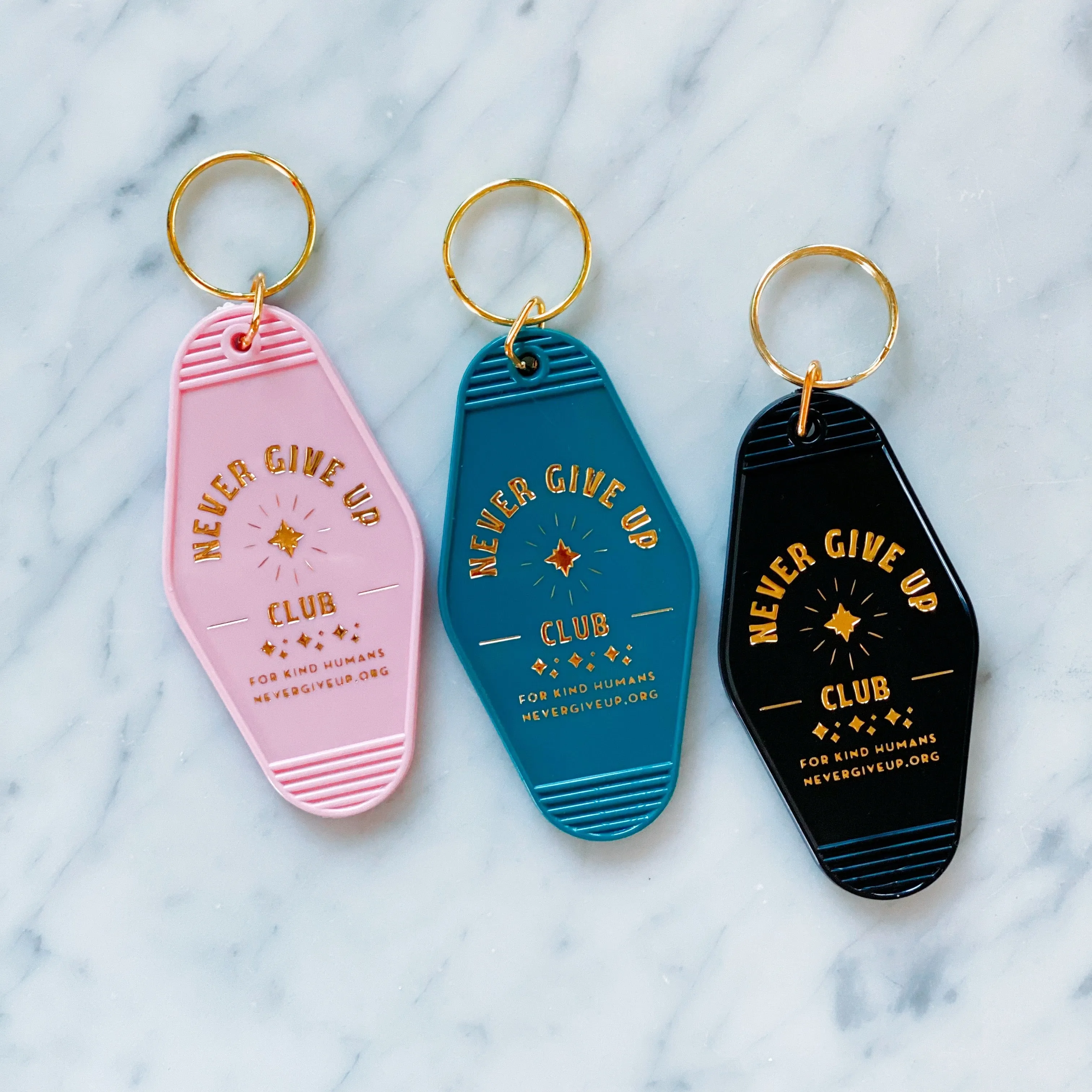 MOTEL KEY CHAIN - NEVER GIVE UP CLUB