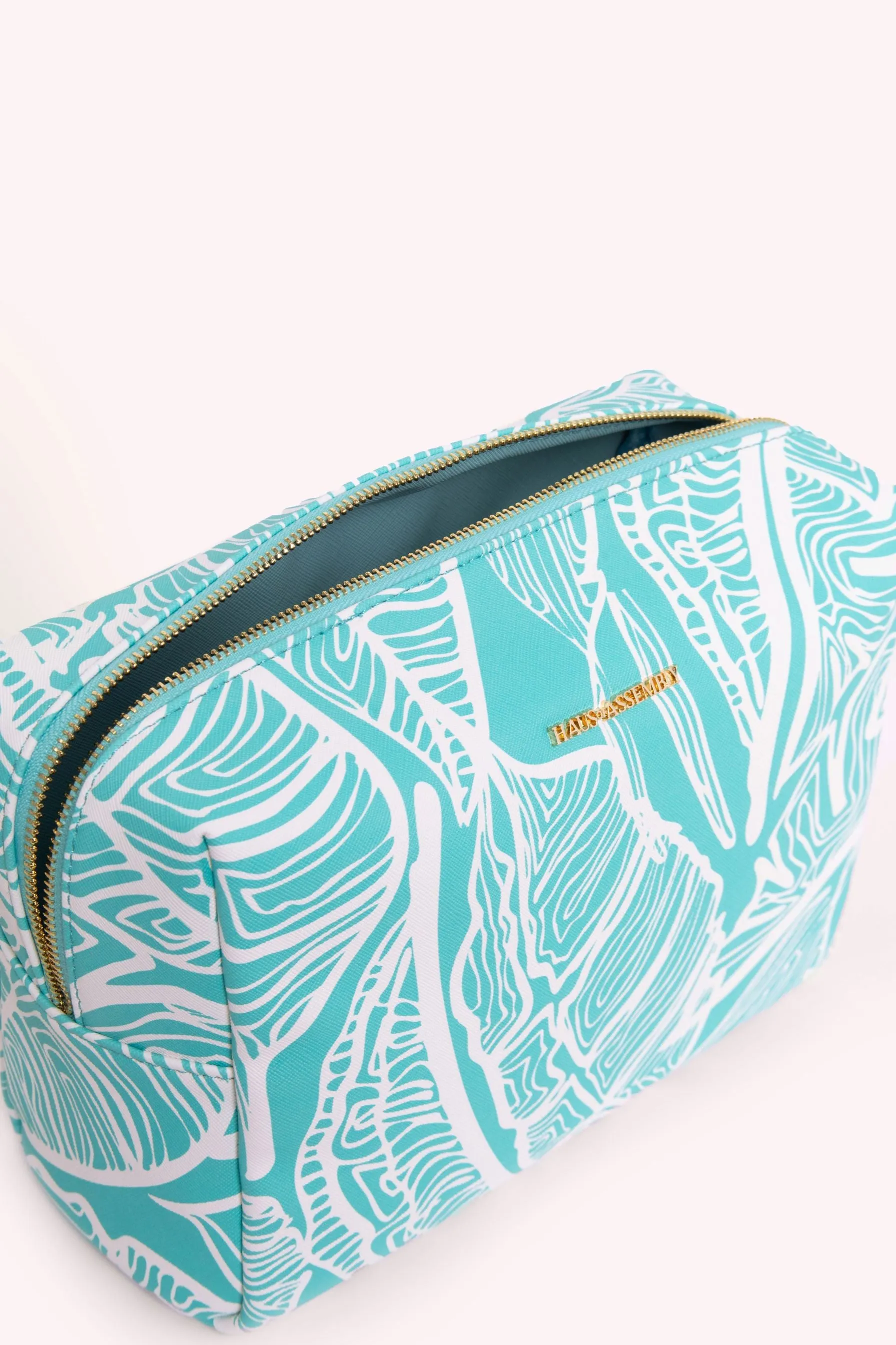 TOILETRY BAG-  AQUA BANANA LEAVES