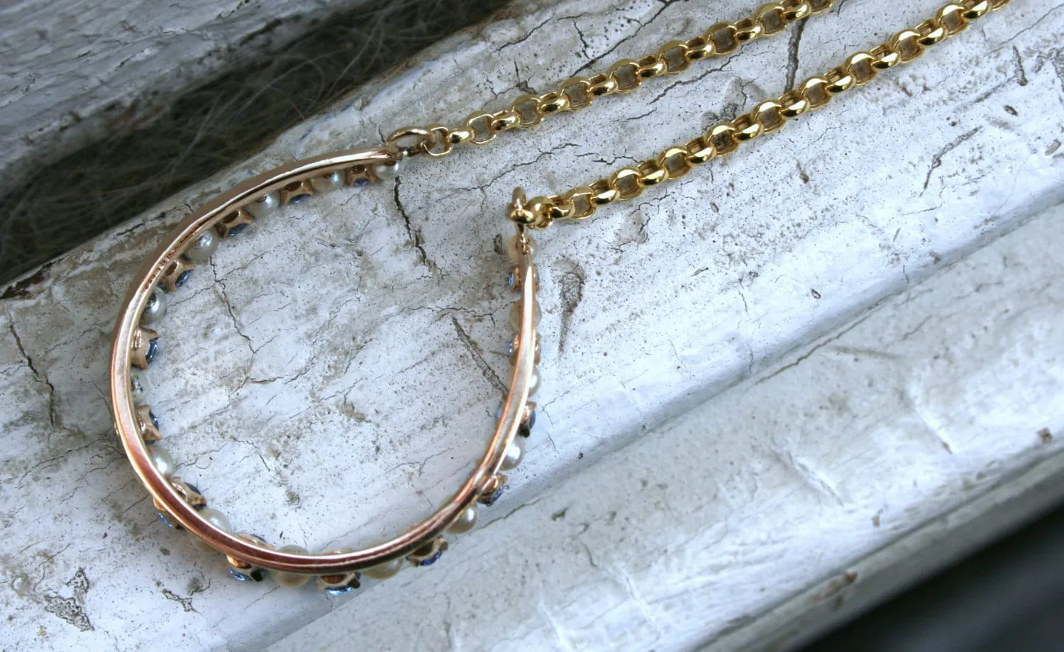 Vintage 14K Yellow Gold Pearl and Sapphire Horseshoe Necklace.