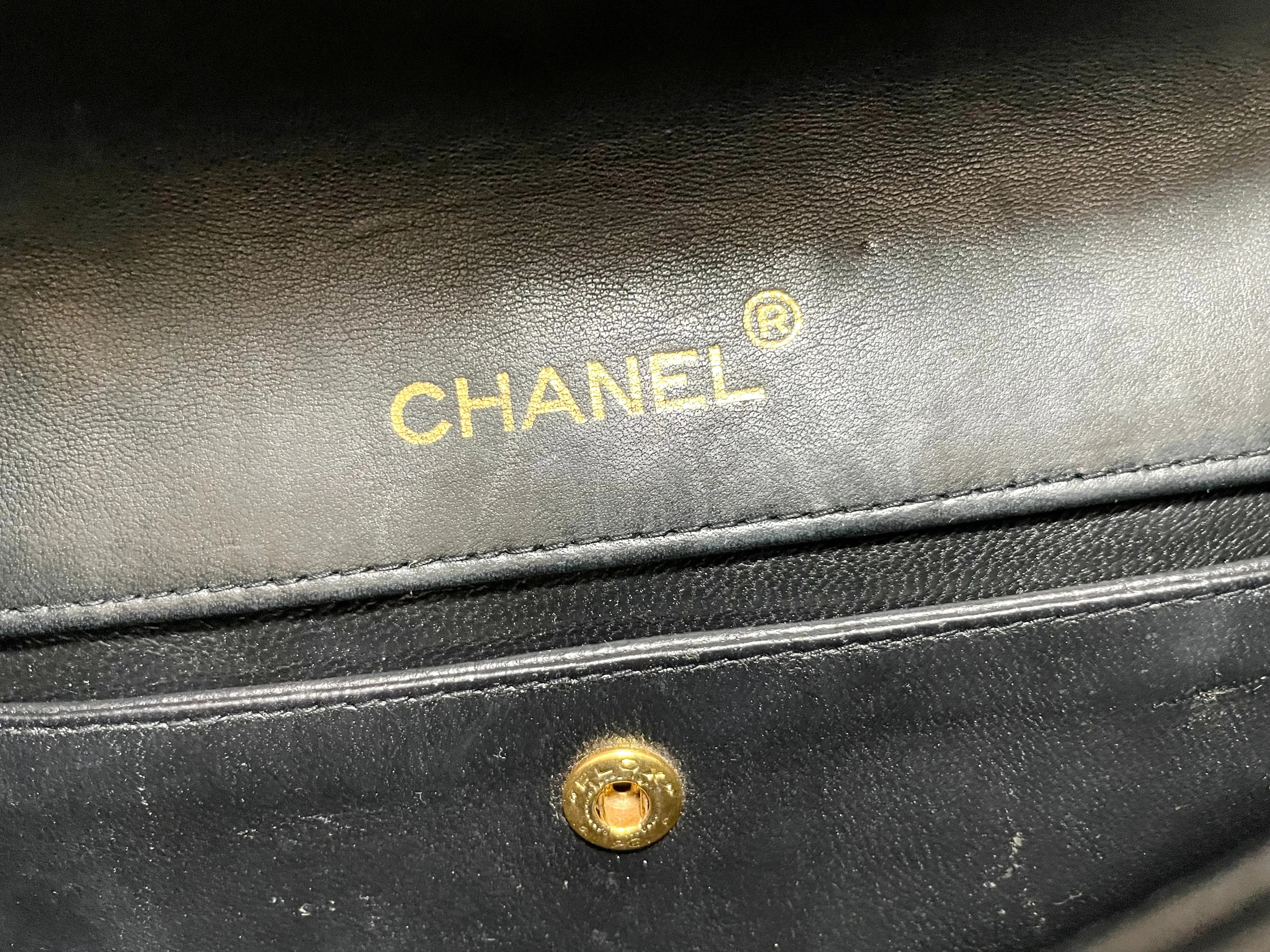 Vintage Chanel dark navy lambskin leather oval shape 2.55 chain shoulder bag with white pipings and CC closure. Rare purse. 061126ac3