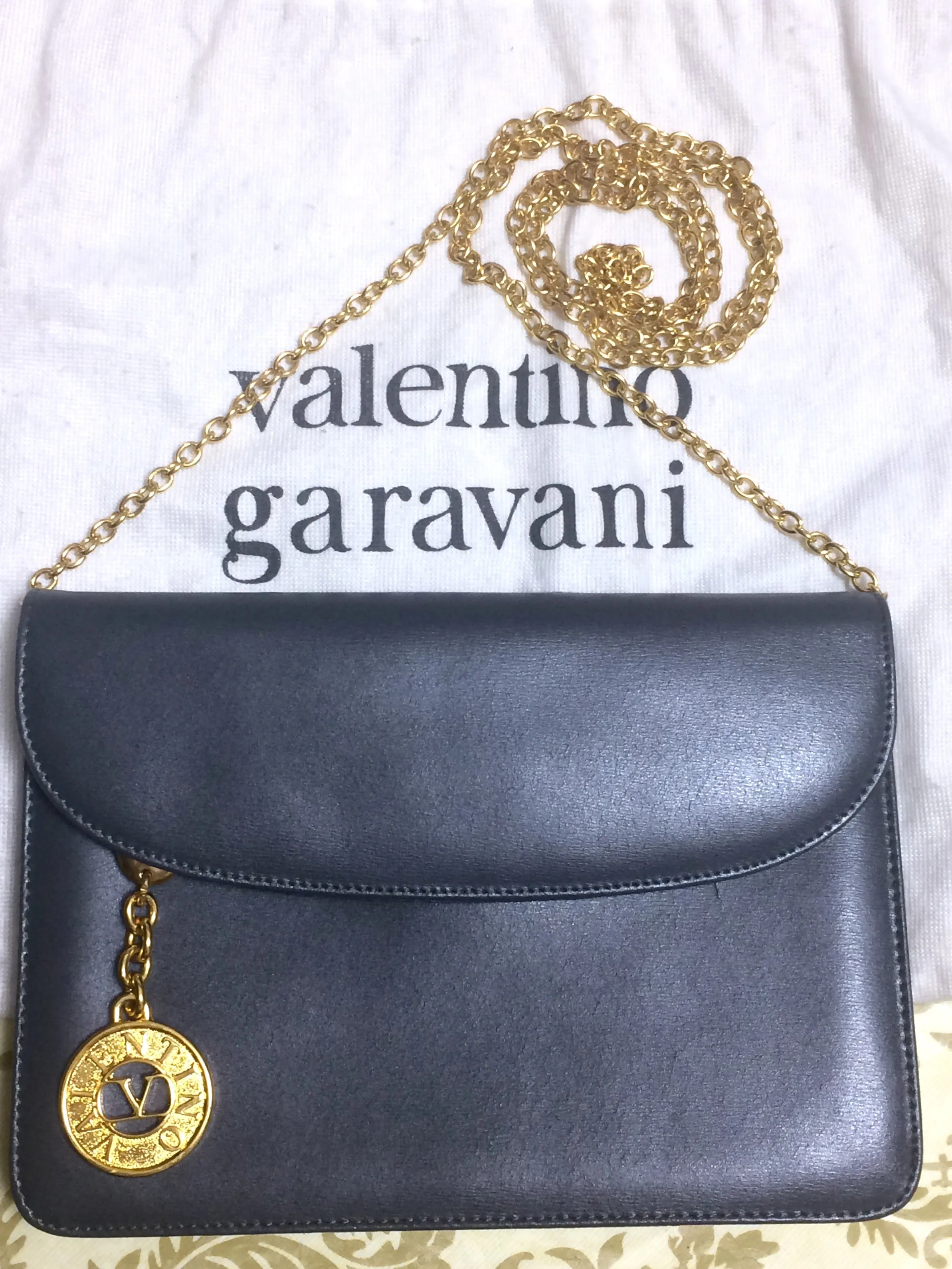 Vintage Valentino Garavani, gray leather chain shoulder bag with golden round V motif charm. Can be clutch bag as well. 060531r7