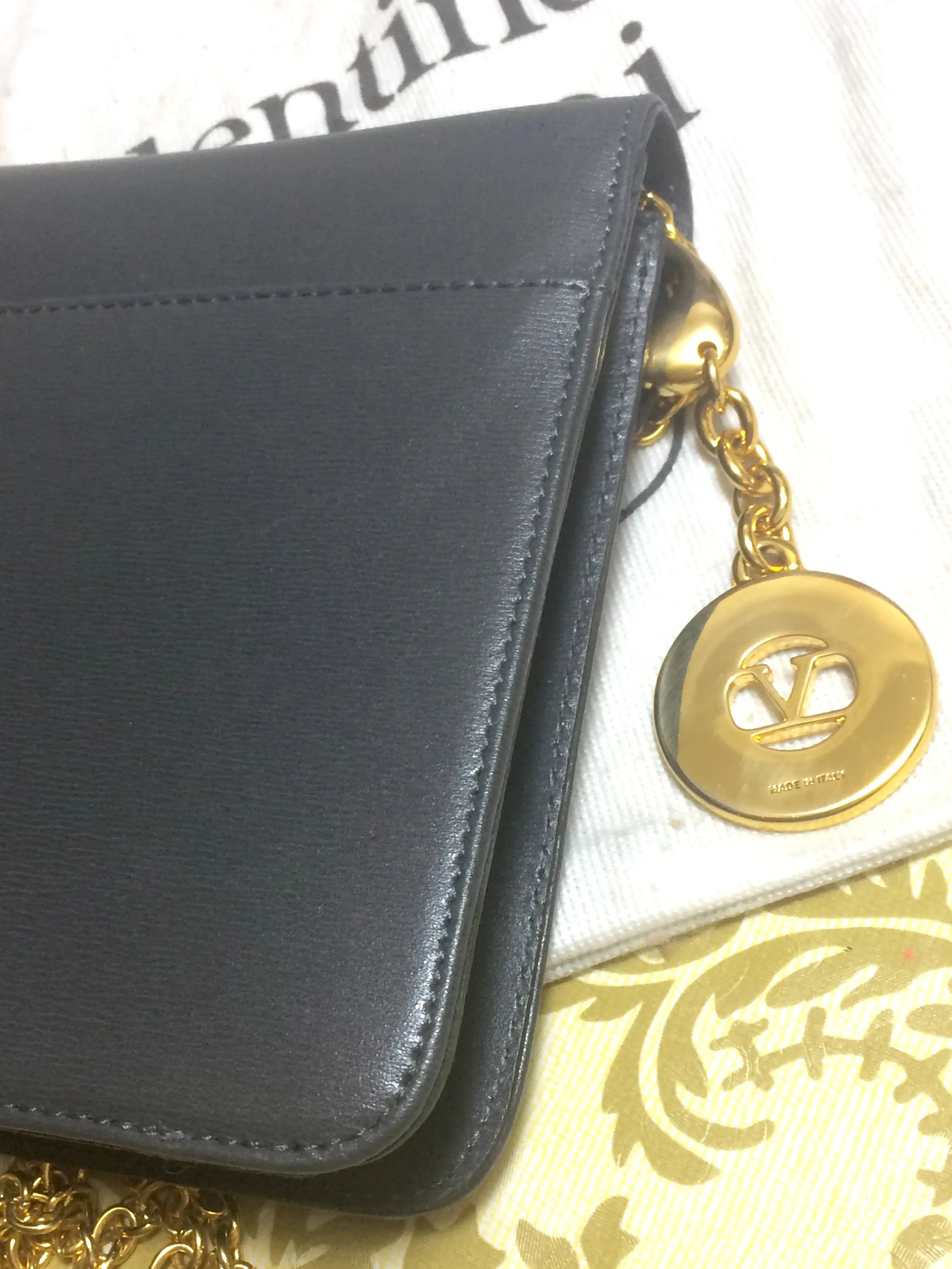 Vintage Valentino Garavani, gray leather chain shoulder bag with golden round V motif charm. Can be clutch bag as well. 060531r7