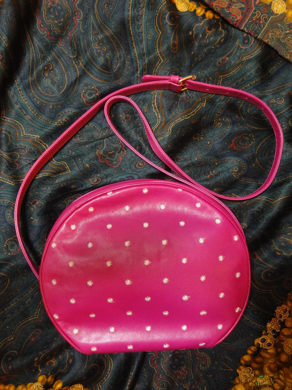 Vintage Valentino Garavani pink leather round shape shoulder purse with white small flower embroideries all over. So chic and cute.