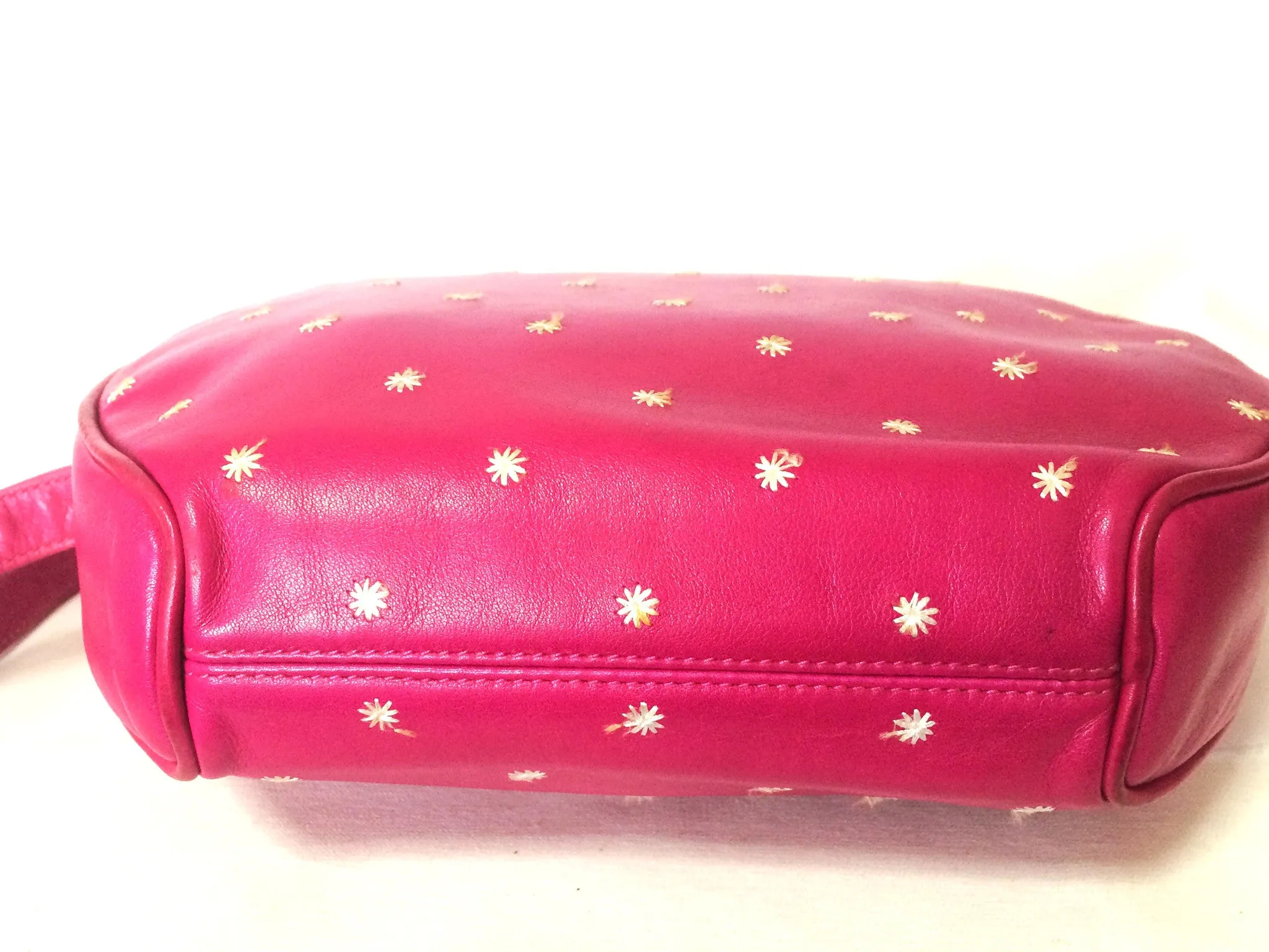 Vintage Valentino Garavani pink leather round shape shoulder purse with white small flower embroideries all over. So chic and cute.