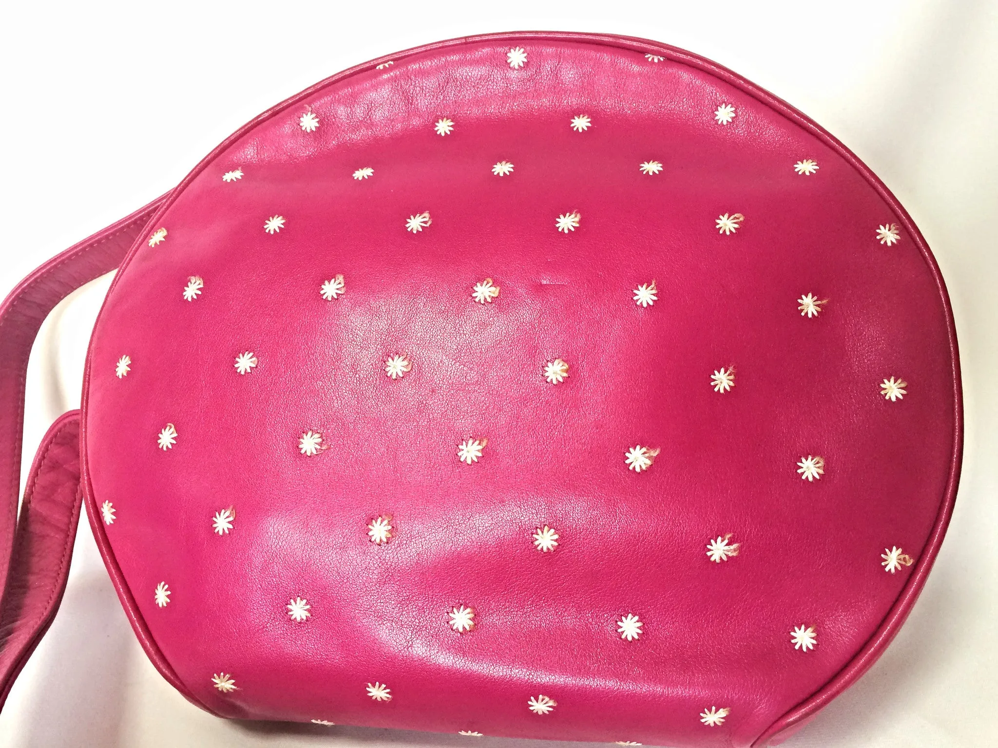 Vintage Valentino Garavani pink leather round shape shoulder purse with white small flower embroideries all over. So chic and cute.