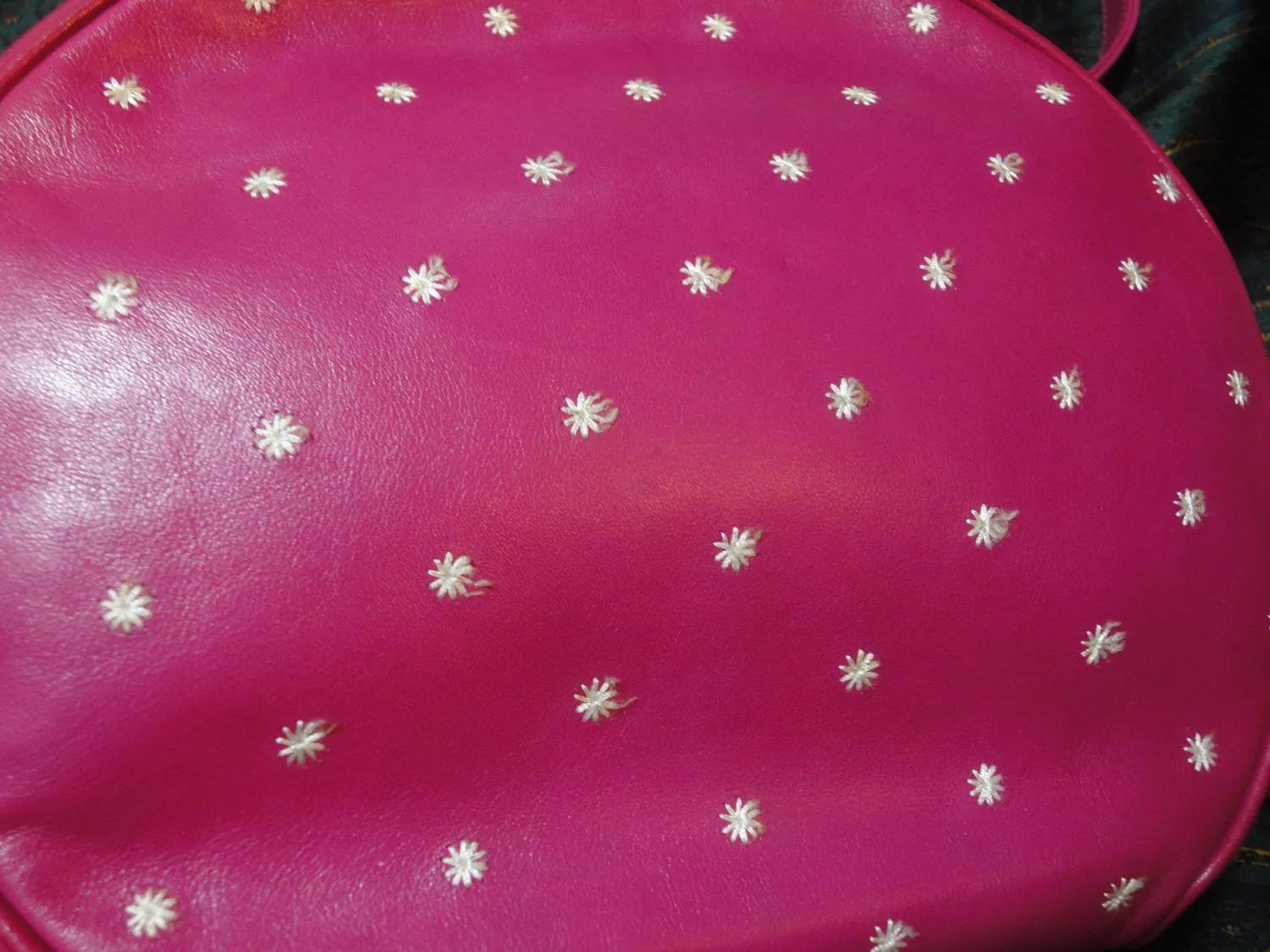 Vintage Valentino Garavani pink leather round shape shoulder purse with white small flower embroideries all over. So chic and cute.