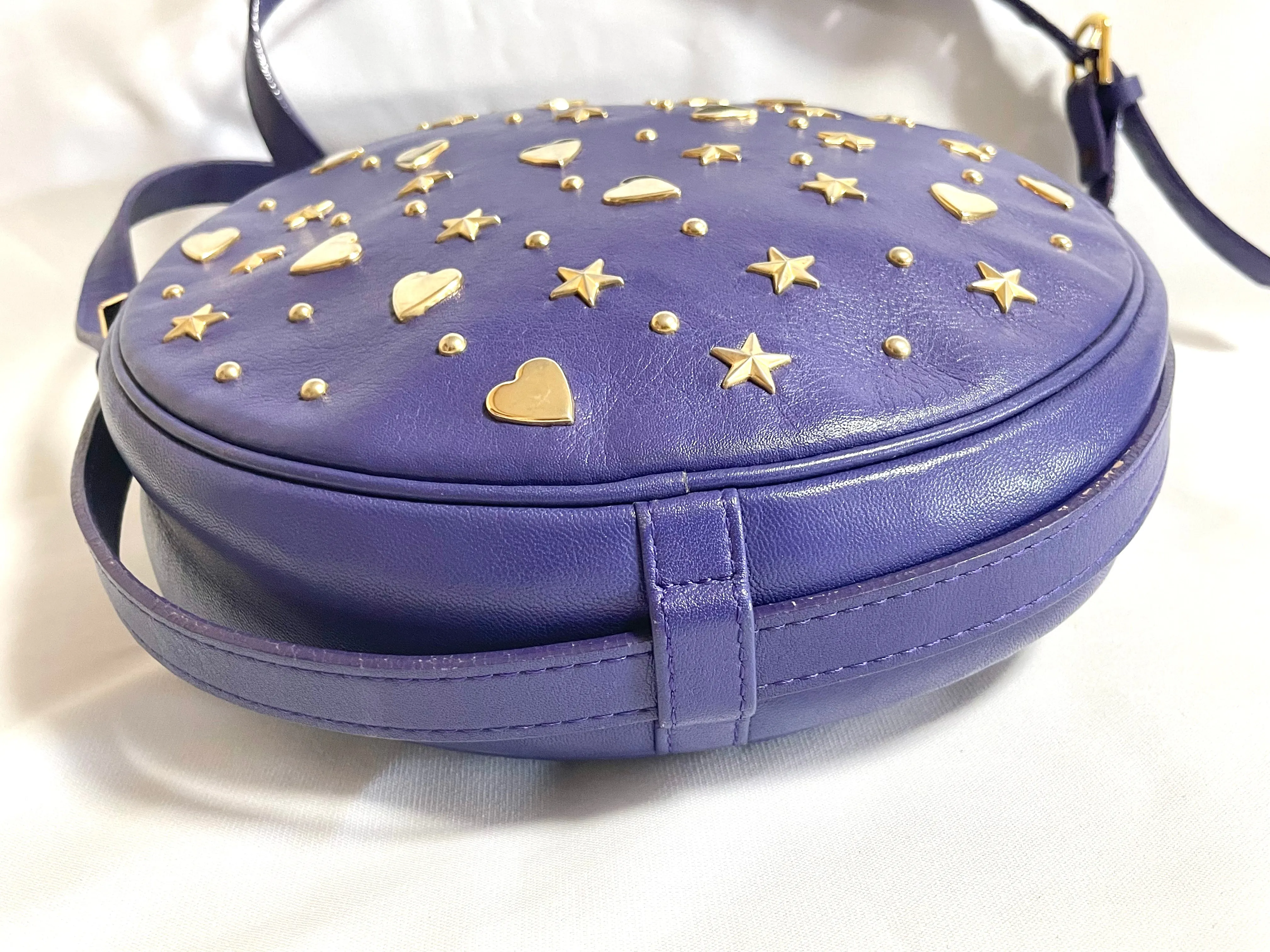 Vintage Yves Saint Laurent purple round bag with heart and star studs. One of a kind leather shoulder bag. 050730ac1