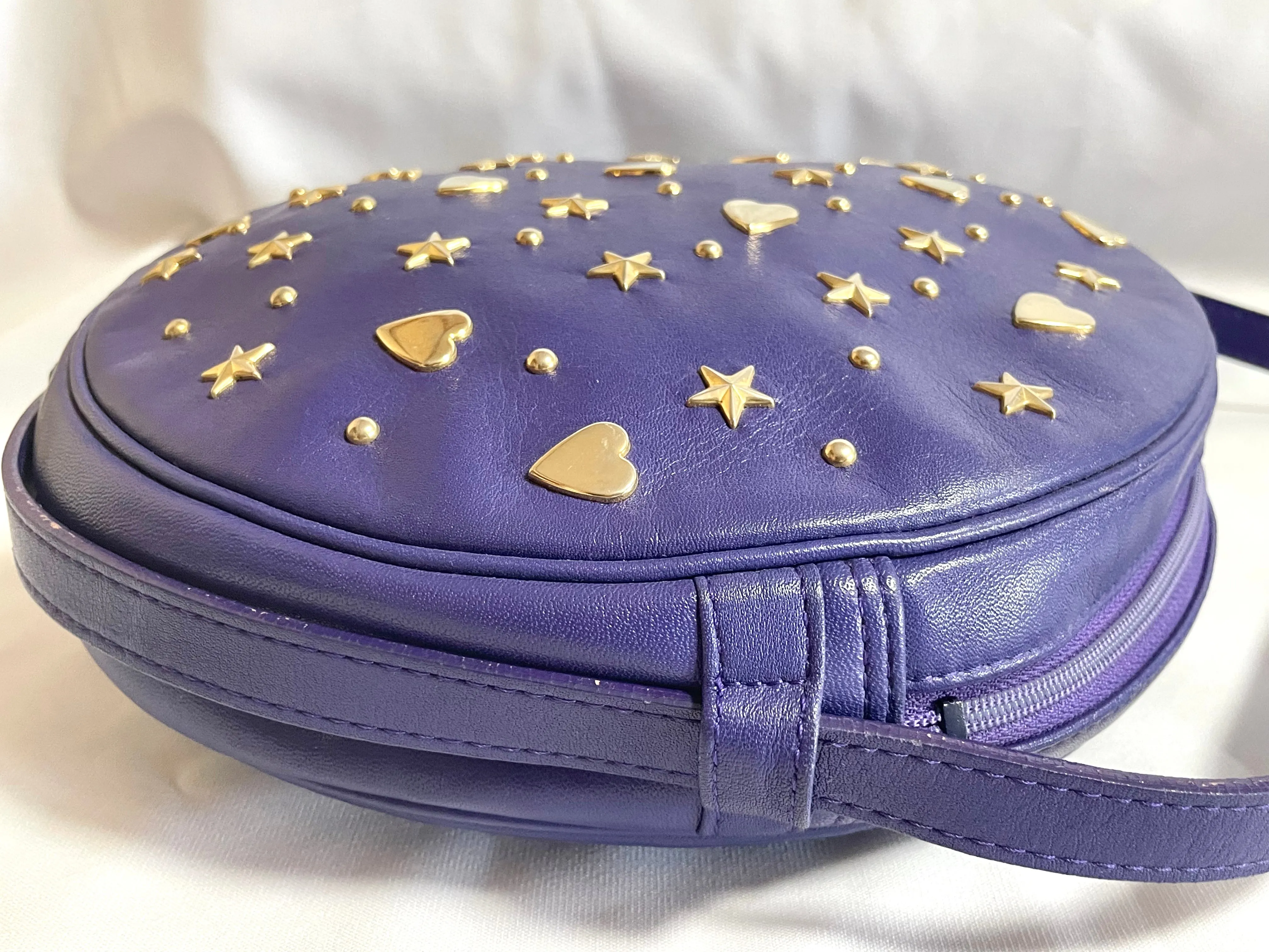 Vintage Yves Saint Laurent purple round bag with heart and star studs. One of a kind leather shoulder bag. 050730ac1