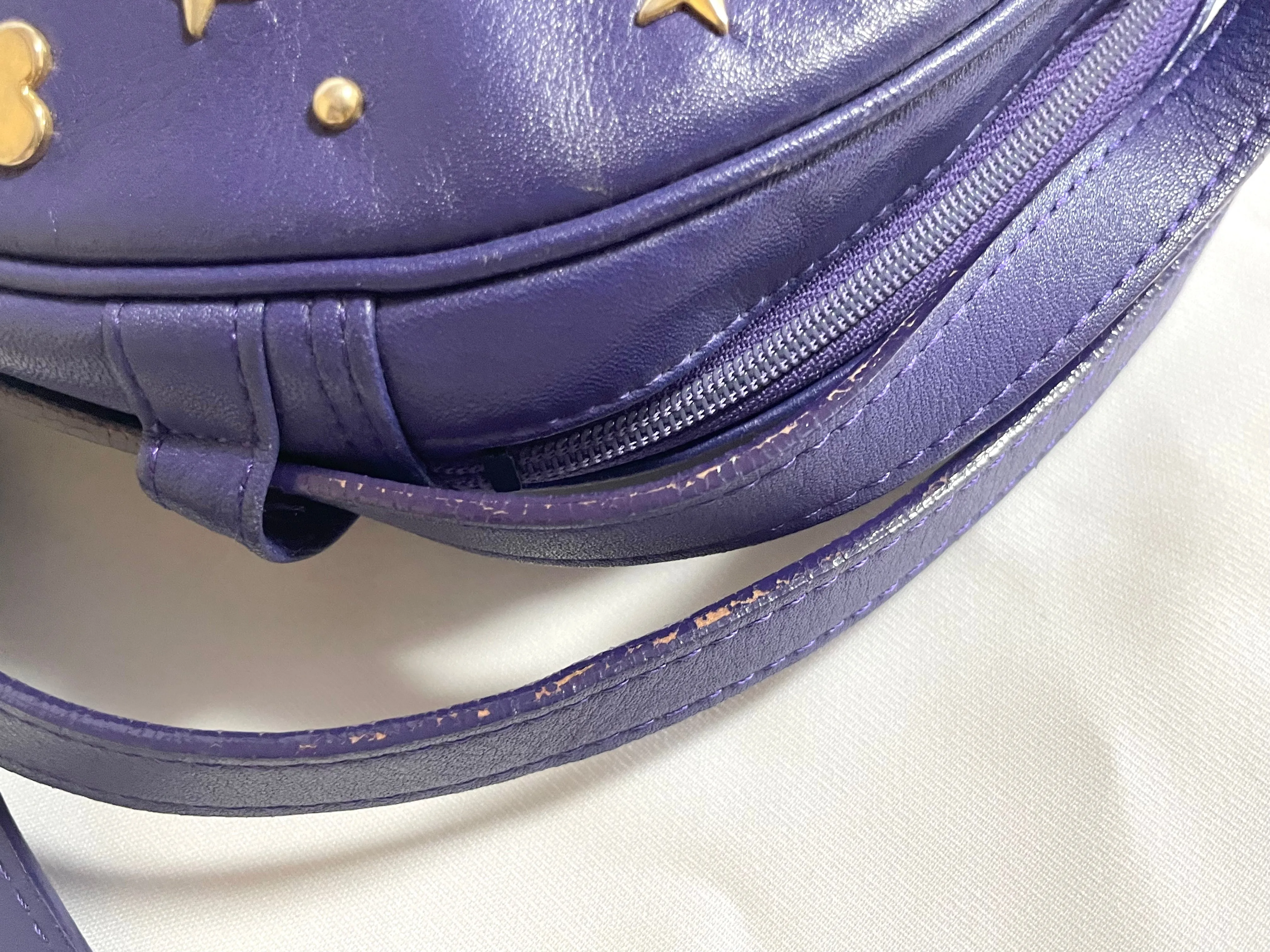 Vintage Yves Saint Laurent purple round bag with heart and star studs. One of a kind leather shoulder bag. 050730ac1