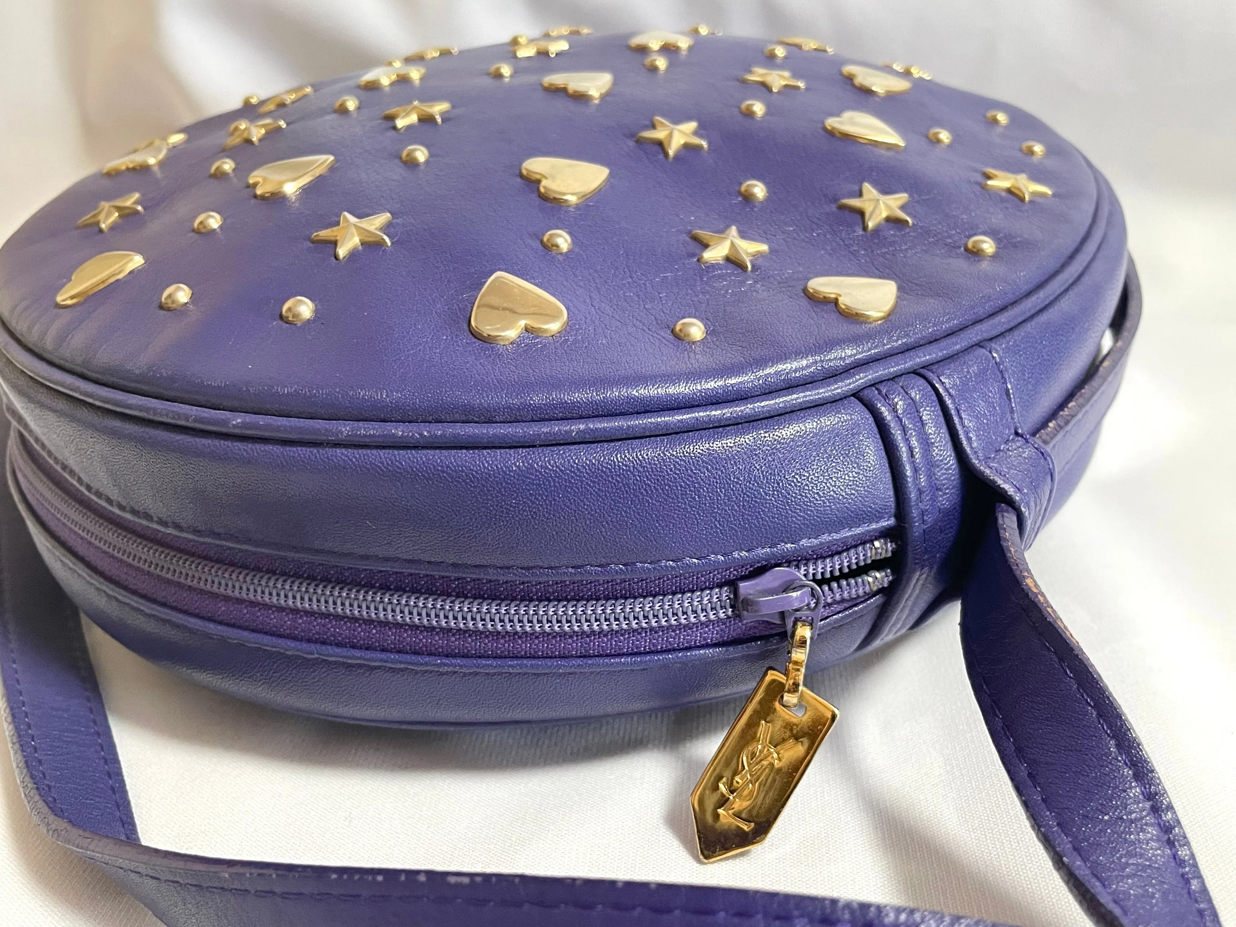 Vintage Yves Saint Laurent purple round bag with heart and star studs. One of a kind leather shoulder bag. 050730ac1